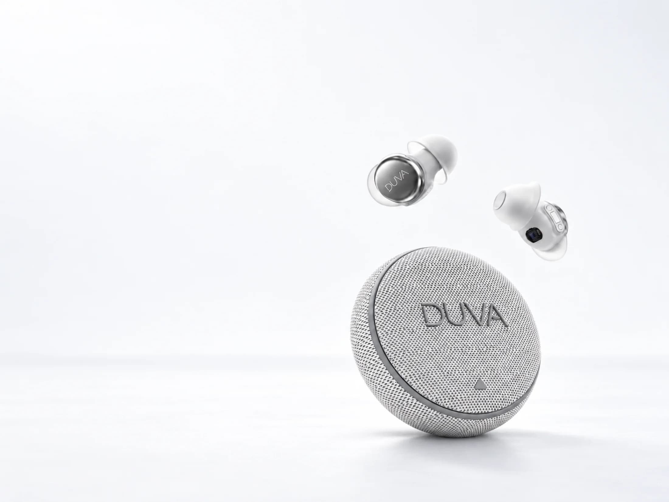 DUVA ONE earbuds above the fabric-covered charging case
