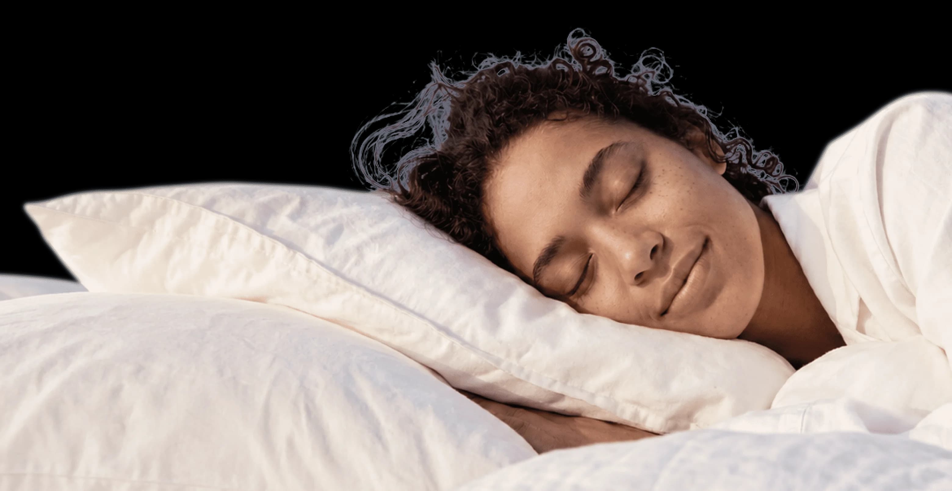 A woman sleeping comfortably on her side