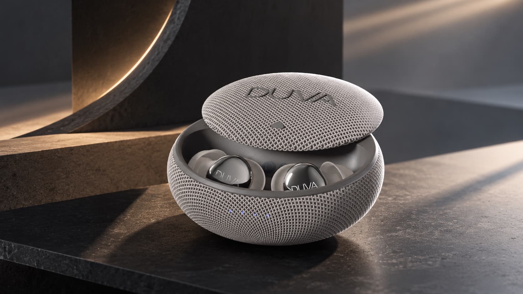 DUVA ONE earbuds and open case on a stone surface in warm light